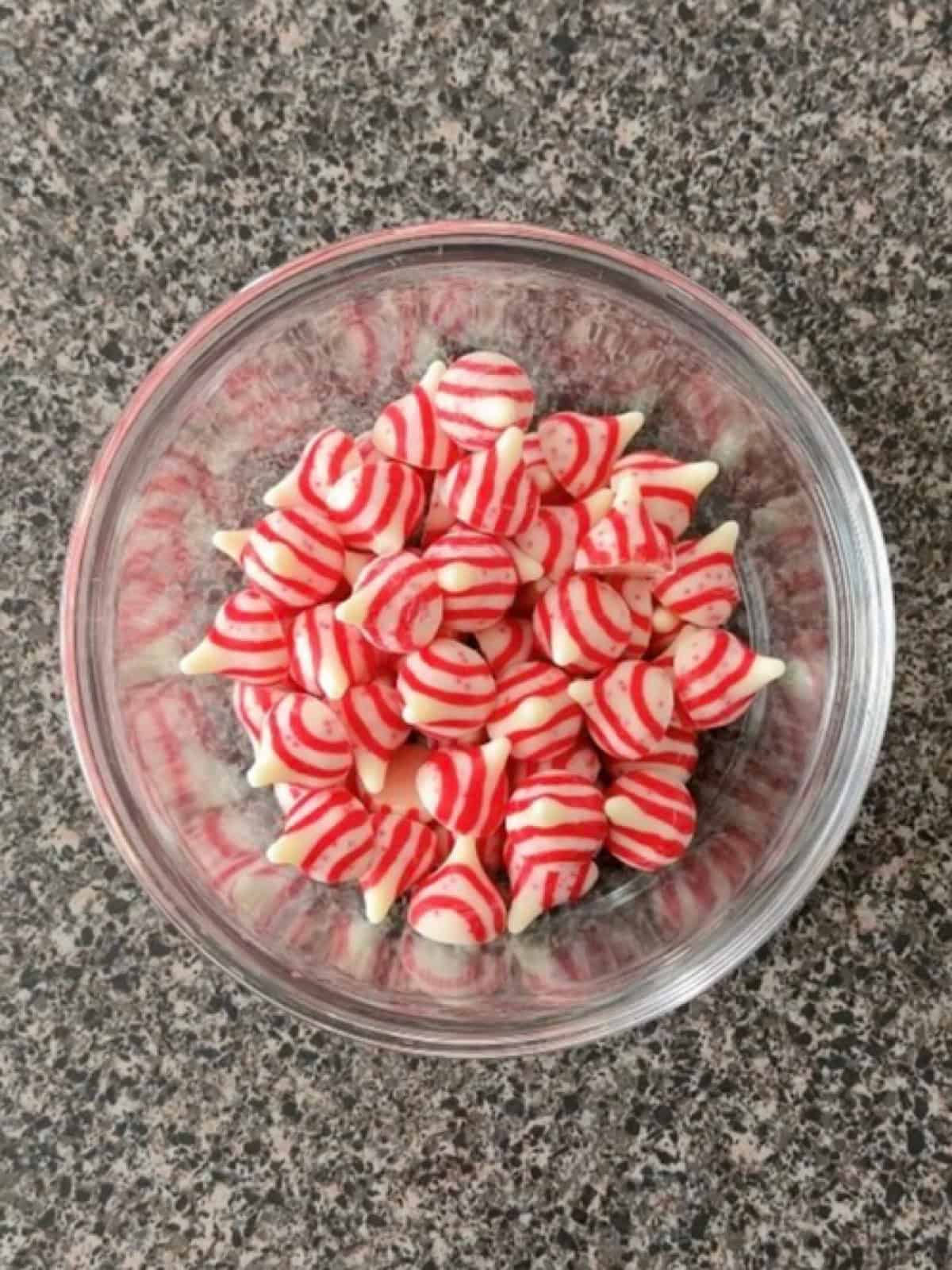 A bowl of Candy Cane Hershey's Kisses.