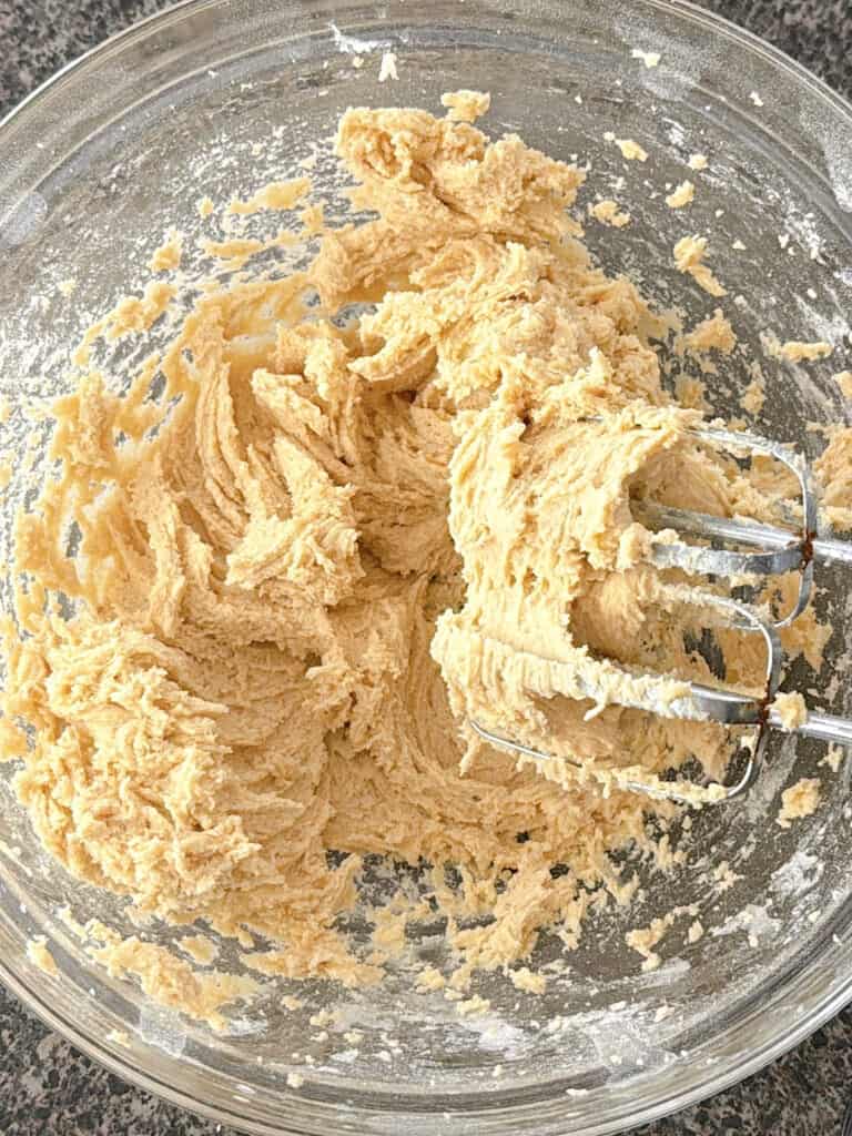 Eggnog cookie dough in a mixing bowl.