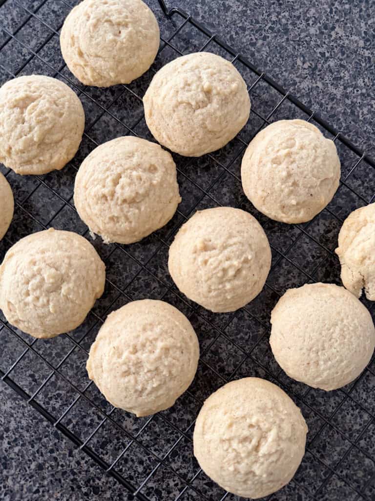 Eggnog cookies on a cooling rack.