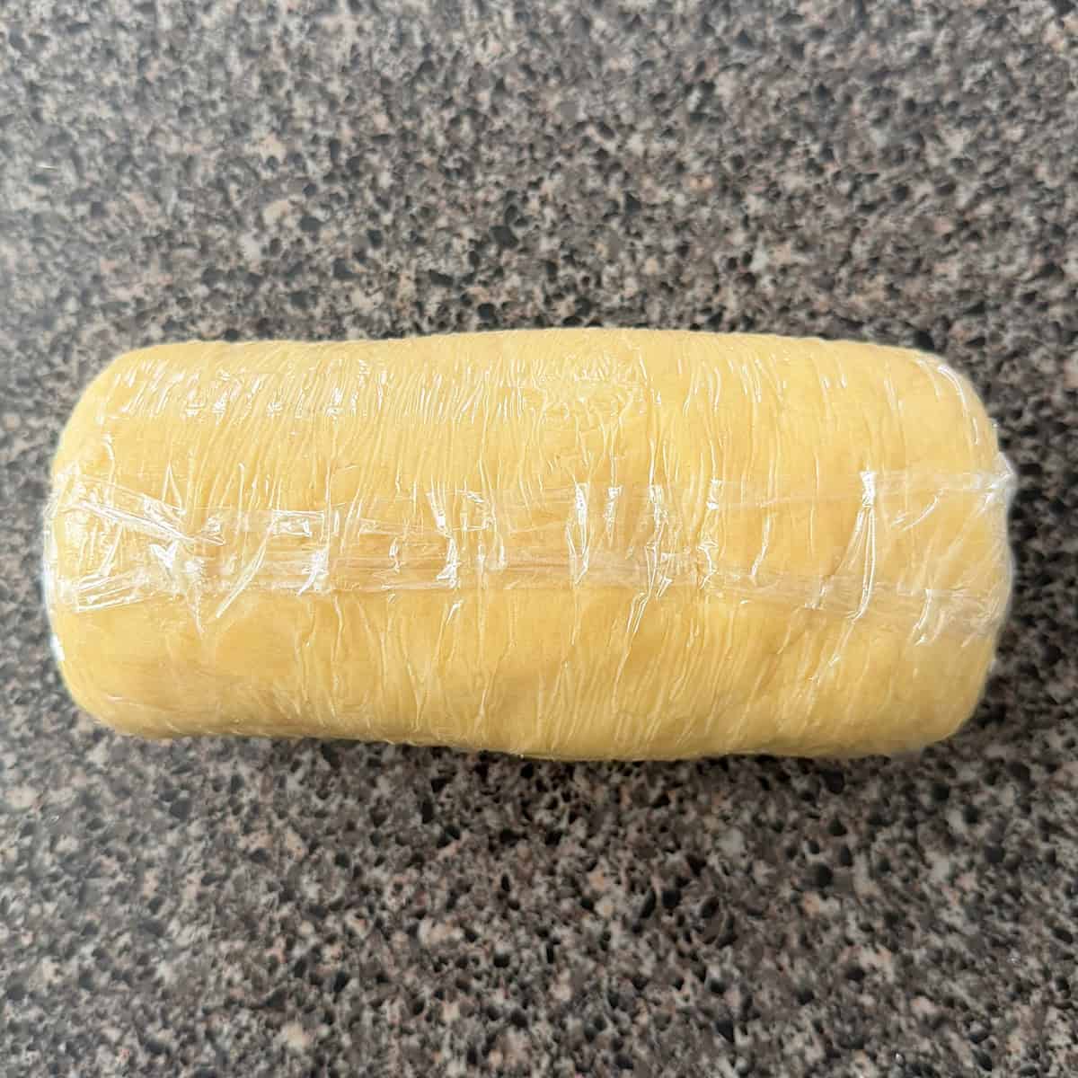 A tube of sugar cookie dough.