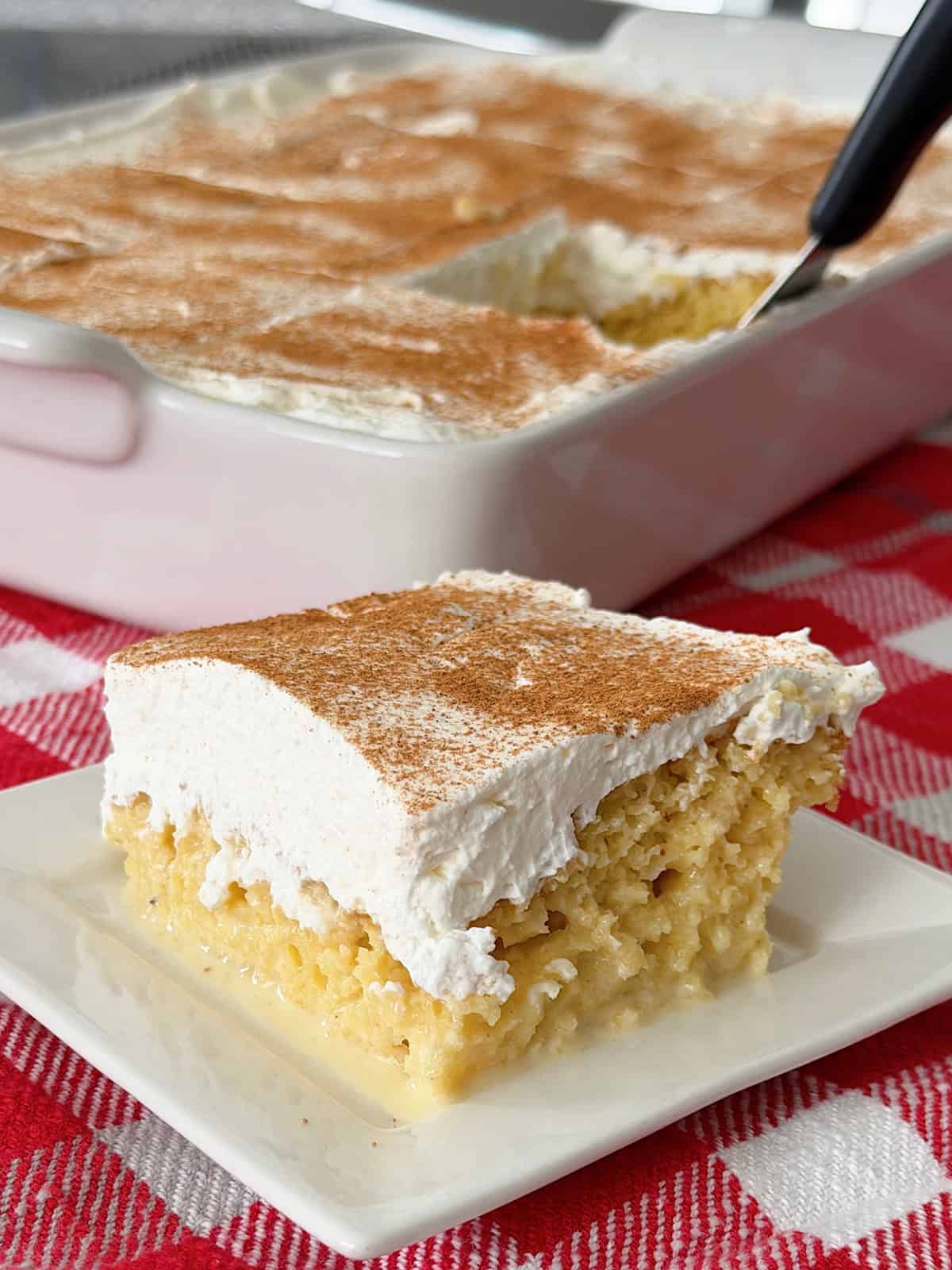 A slice of Eggnog Tres Leches Cake.