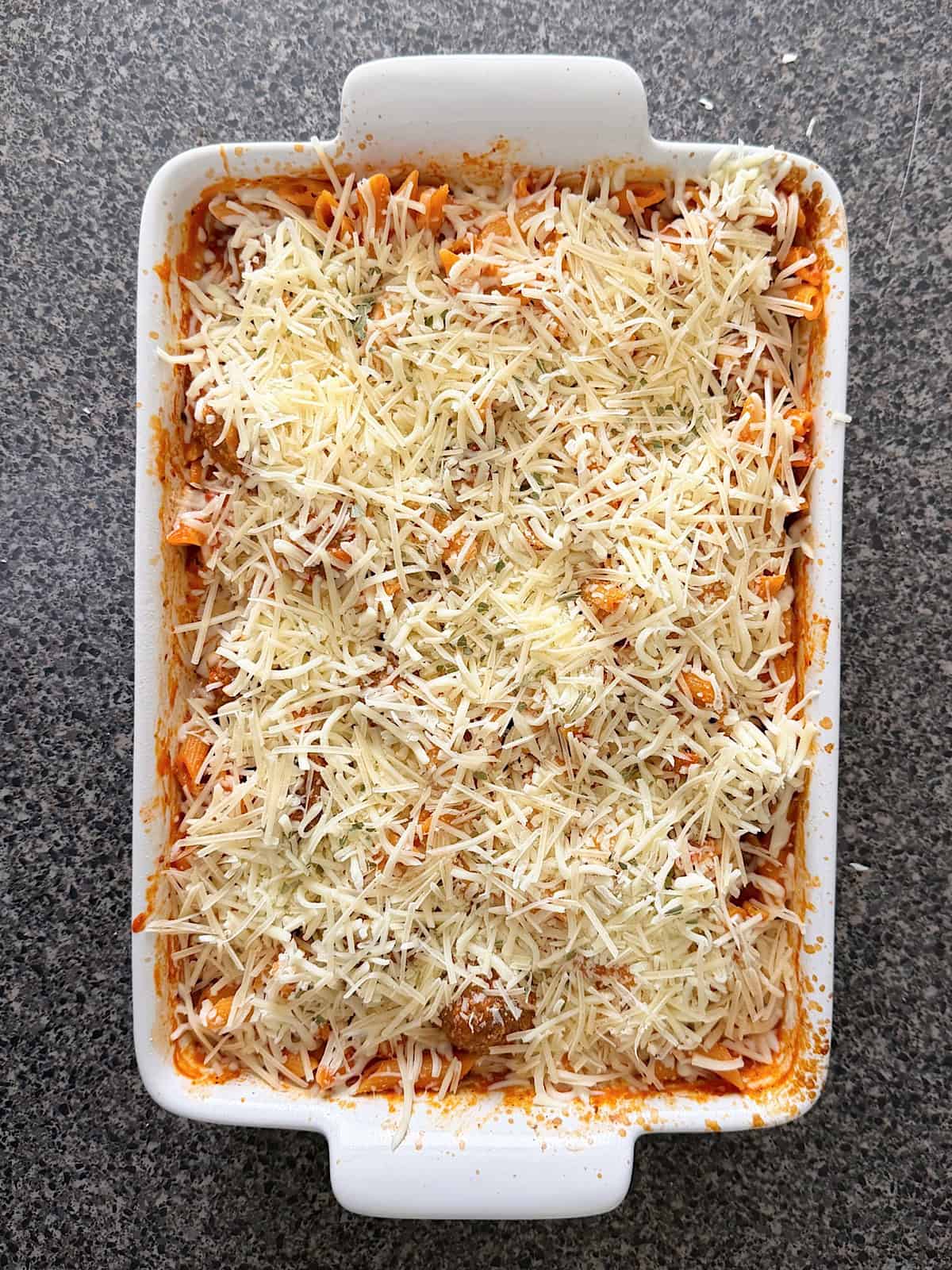 Meatball Casserole in a white baking dish.