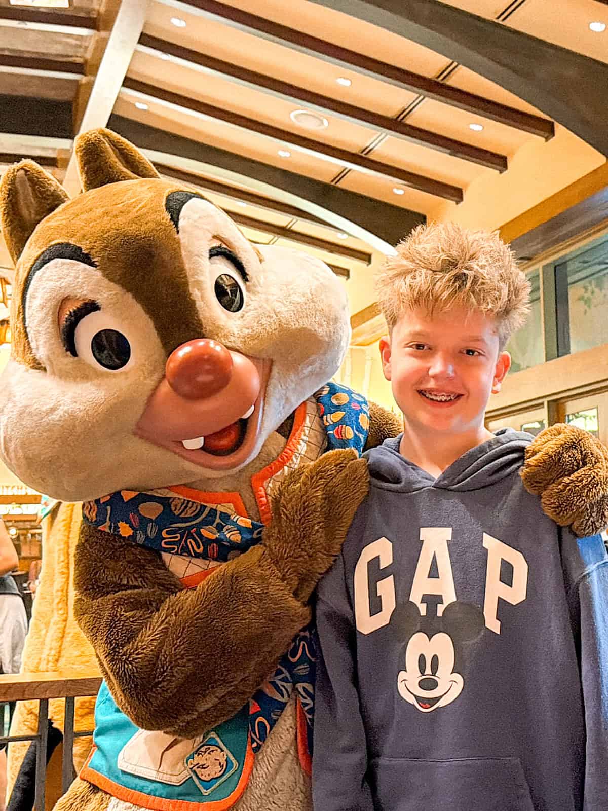 A child and Dale at Storyteller's Cafe at Disney's Grand Californian Hotel & Spa.